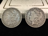 2 silver Morgan dollars, 1880 and a 1884