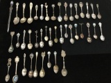 Collection of 41 antique to vintage collector spoons from all around the world