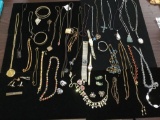Amazing collection of estate necklaces, bracelets, watches, earrings, and pendants