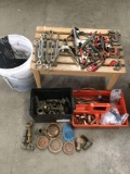 Large lot of clamps, plumbing parts, drains, misc pipe pieces, etc see pics
