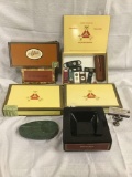 Collection of cigar boxes, cigar cutter, and 2 ashtrays see pics