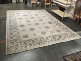 Handmade Moneni wool rug w/ cream base and blue pattern