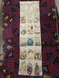 A hanging closet organiser stuffed w/ a large variety of estate jewelry, see pics