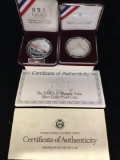 2 U.S. mint silver proof coins from the 1988 and 1992 olympic games