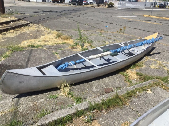 Grumman Boats 17 foot aluminum canoe with sail.
