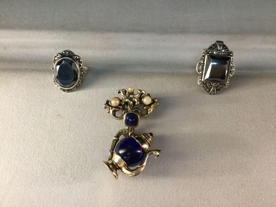 2 beautiful vintage matching sterling silver rings w/ dark cut stones and a genie lamp brooch
