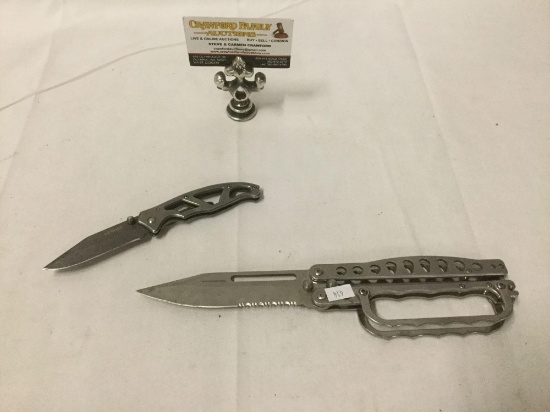 Lot of 2 stainless steel pocketknives incl. the smaller Gerber, and knuckle grip larger knife
