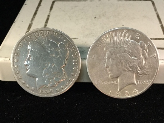 1892-O silver Morgan dollar and a 1934-S silver Peace dollar