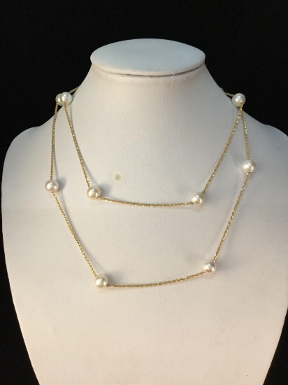 Amazing 14K yellow gold and pearl necklace approx. 23 inches long @ 8.1 grams