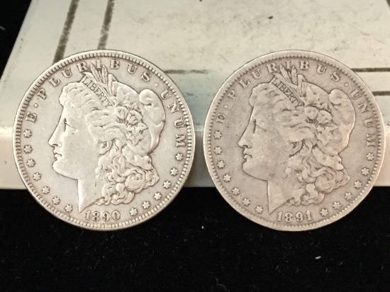 1890-P and a 1891-P silver Morgan dollars