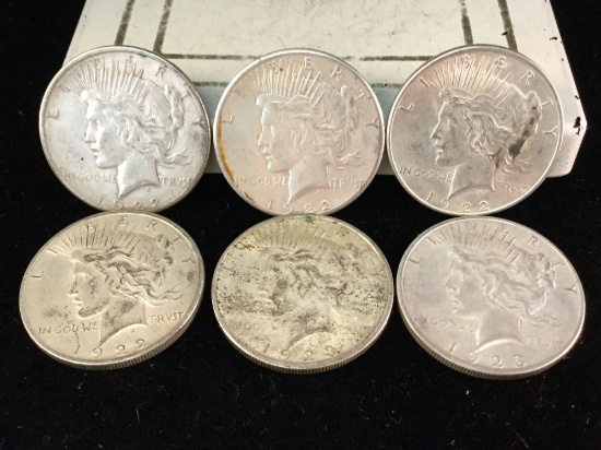 4 silver 1922 and 2 silver 1923 Peace dollars