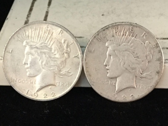 1922 and a 1922-S silver Peace dollars