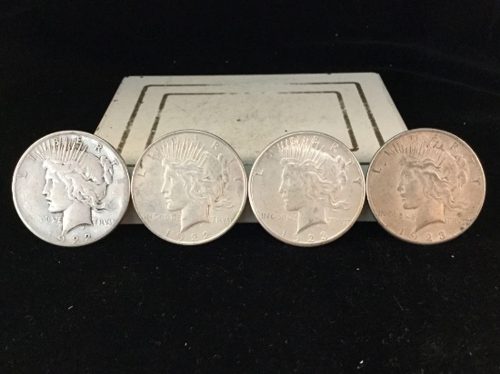 2 silver 1922 and 2 silver 1923 Peace dollars, 4 total coins
