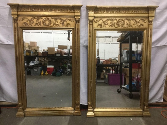 Pair of large Henredon hanging mirrors with opulent gilded Victorian design