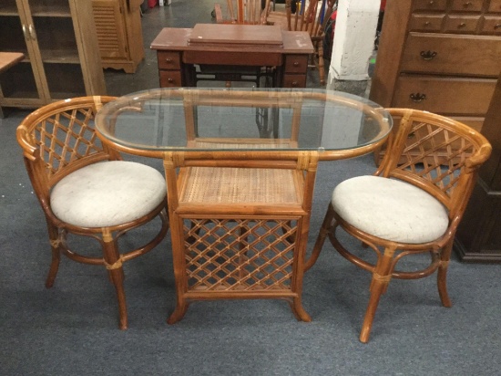 Modern glass top cane/bamboo woven table with matching chairs