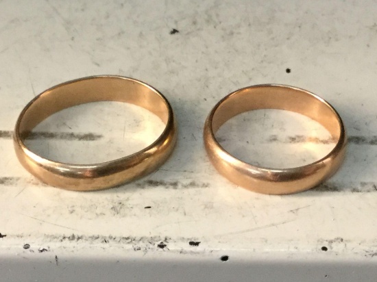 2 simple 14K gold bands sizes 8 and 9 @ 9 grams total