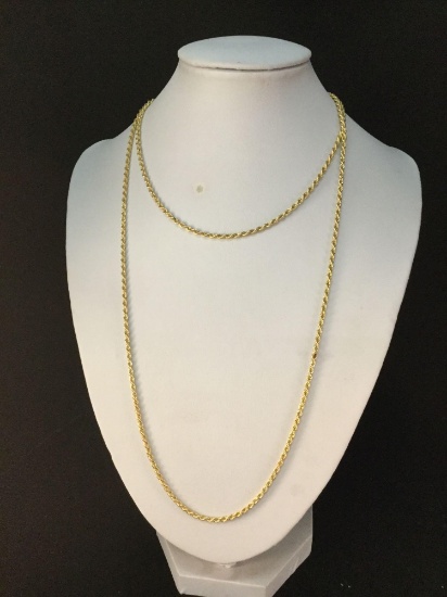 Long and heavy 14K gold rope necklace approx. 34 inches long @ 14.3 grams