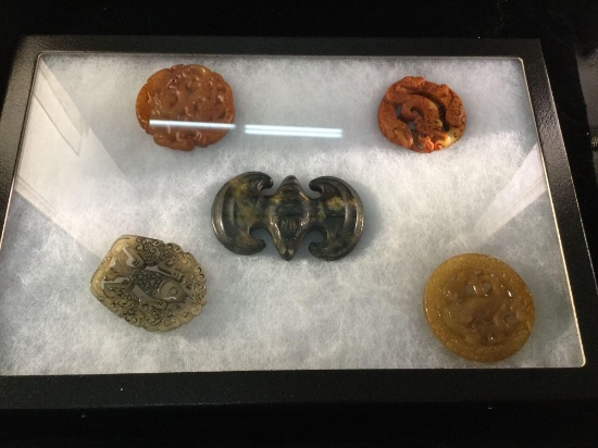 Display case w/ 5 old Asian carvings of Jade and stone