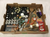 collection of assorted paints and tools for model building, paints, pliers, scissors, etc.