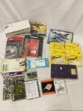 18 assorted model kits, all complete. Planes, tank upgrades, vehicles, Jerry cans, etc, see pics.