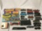 Large lot of assorted model train cars, engines, various scales. See pics