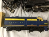 Huge Lionel Electric Trains collection w/ track pieces, switch plate, Engine 1110, 2x Santa Fe 208,