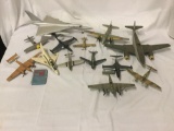 13 model airplanes, in various conditions. Some complete some need work.