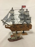 Pair of wooden ship models, 3 and 9 inches tall