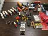 Collection of HO scale model train cars, wiring, detail accessories, Woodland Scenics Lumberjacks HO