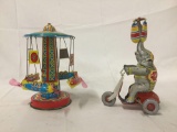 Pair of Metal Toys, spinning circus ride Schylling Toys. 7.5 inches tall