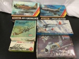 Lot of 6 started plastic model kits with boxes.