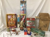 Lot of misc. toys and collectibles ; Mr Peanut nut dispenser , Mr Meow Wal clock, Wings of Texaco
