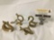 Set of 4 vintage brass napkin holders from Bangladesh - swan, dolphin, etc