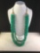 3 strand necklace of attractive emerald Green stone beads
