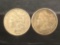2 silver Morgan dollars, 1882-O and a 1886-P
