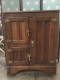 Antique oak icebox with original brass hardware and glass shelves - great condition