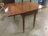 Antique mahogany drop leaf table - with casters