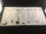 Collection of 8 sterling silver necklaces w/ nice silver pendants