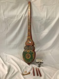 Antique wooden stringed guitar like instrument from Bhutan - colorful design as is