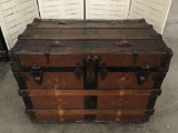 Antique wooden travel steamer trunk with interior shelf storage compartment