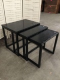 Trio of modern black nesting tables