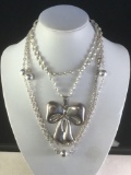2 attractive vintage sterling silver necklaces, 1 w/ silver balls & 1 w/ large ribbon pendant