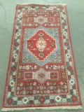 Vintage Iranian unique patterned hand made wool rug with fringe - unmarked - green and reds