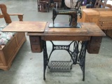 Antique cast iron Singer sewing machine with original table