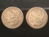 2 silver Morgan dollars, 1896-O and a 1897-S