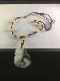 Fine carved white Jade perched Phoenix bird and dark Ruyi branch w/ jade bead necklace