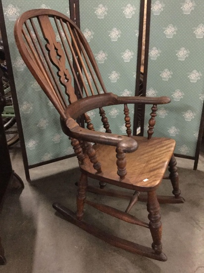 Antique windsor style back carved heavy oak rocking chair