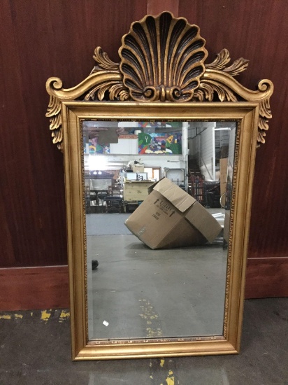 Vintage mirror with ornate clamshell design, has missing piece on top as is