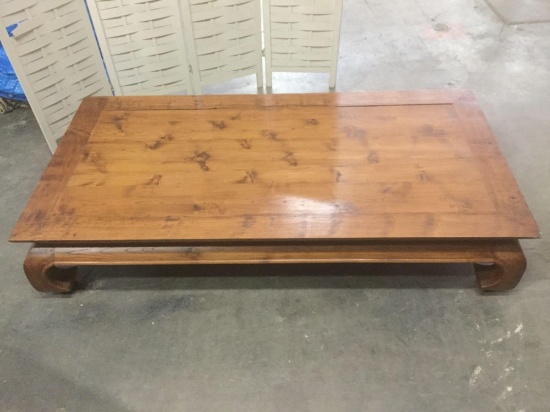 Large solid wood Indonesian coffee table. Has a crack on top, see pics.