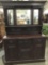 Antique 1800's carved stately sideboard server with mirrored back & dark mahogany finish